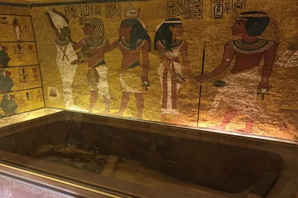 Ancient Egyptian wall paintings inside a tomb in the Valley of the Kings.