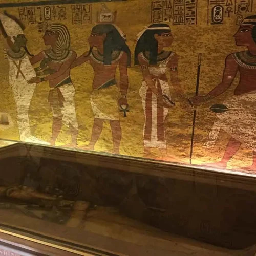 Ancient Egyptian wall paintings inside a tomb in the Valley of the Kings.