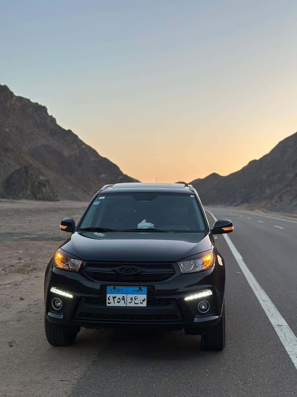 Luxury private transfer SUV driving at night between Luxor and Hurghada, Egypt.